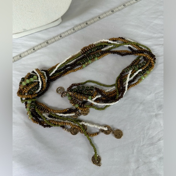 Long multi strand necklace with neutral tone beads and gold dangles - Picture 6 of 6